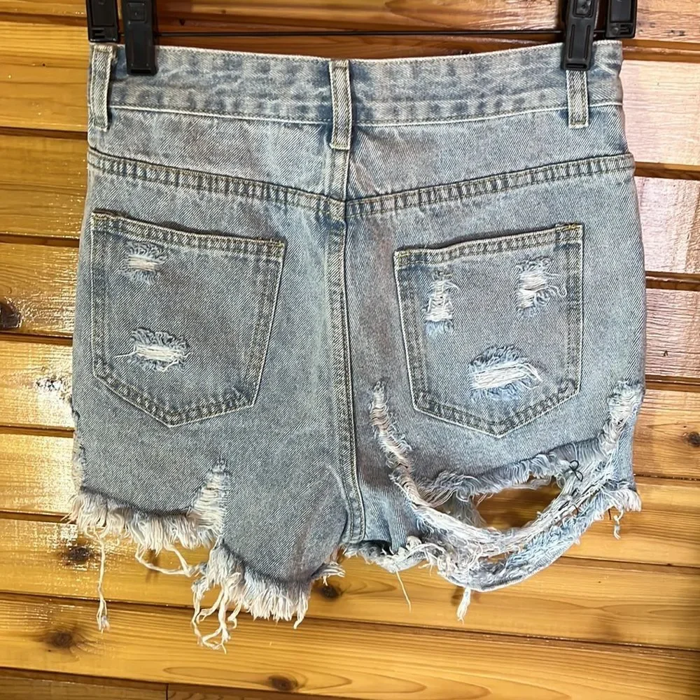 Sexy high rise bum rip jean shorts - Picture 8 of 10
